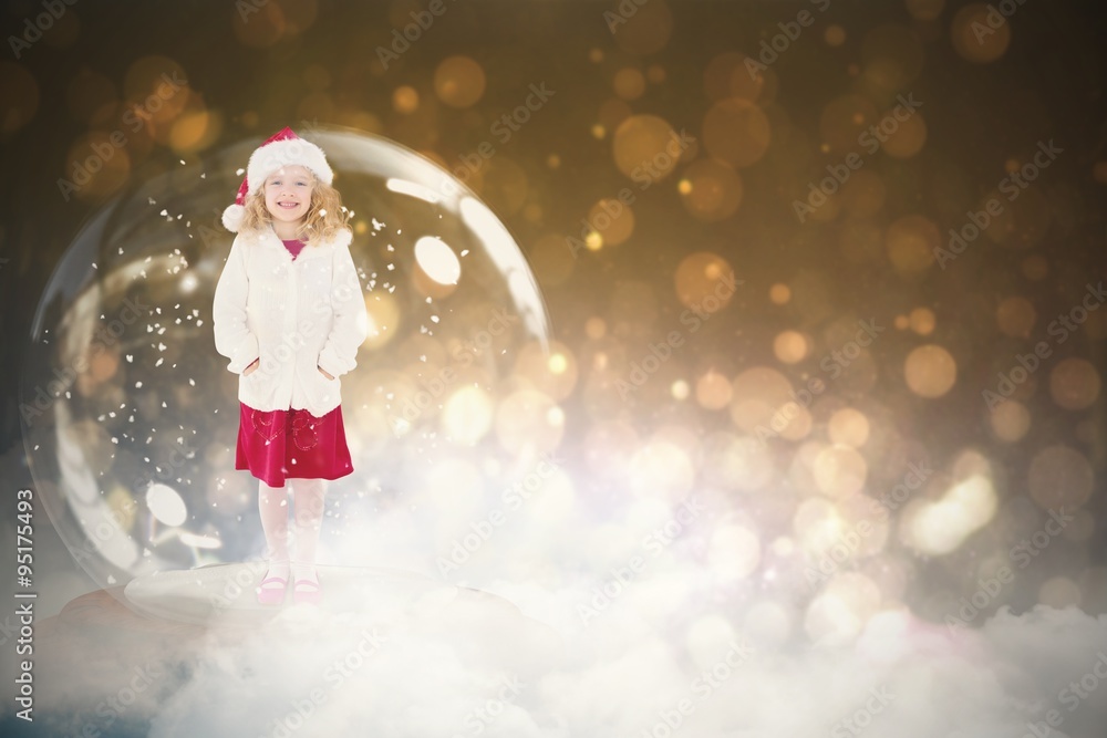 Composite image of festive child in snow globe