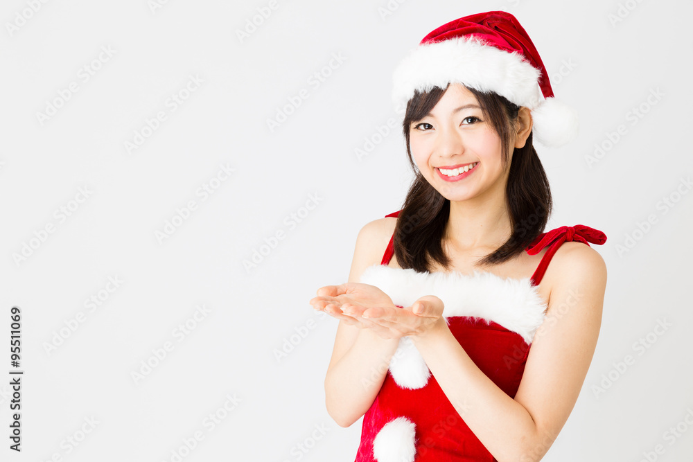 portrait of asian woman wearing santa costume