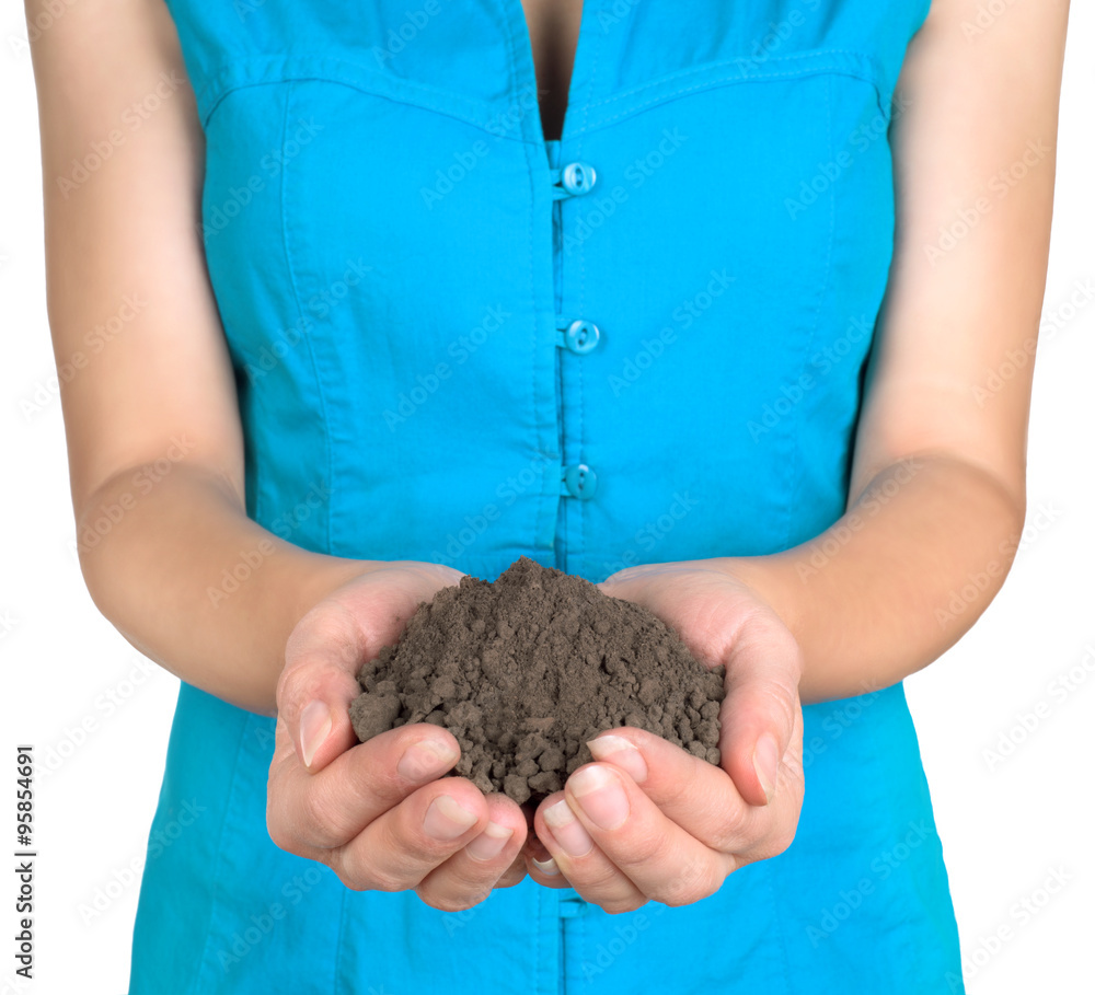 womans hands holding ground, on white background