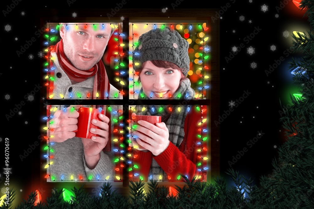 Composite image of couple both having warm drinks