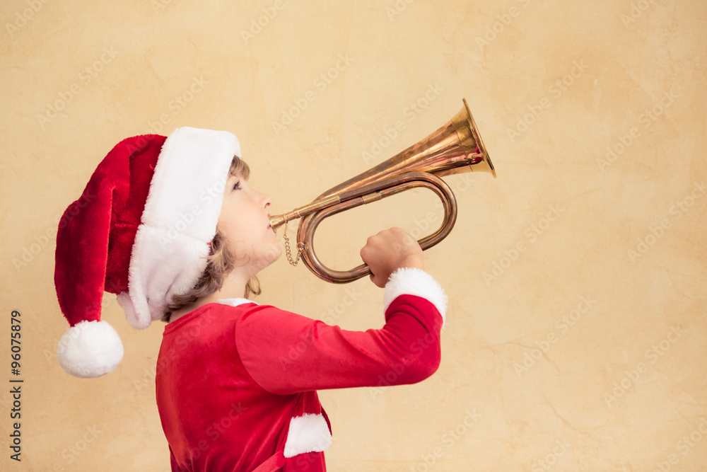 Funny Santa kid with horn