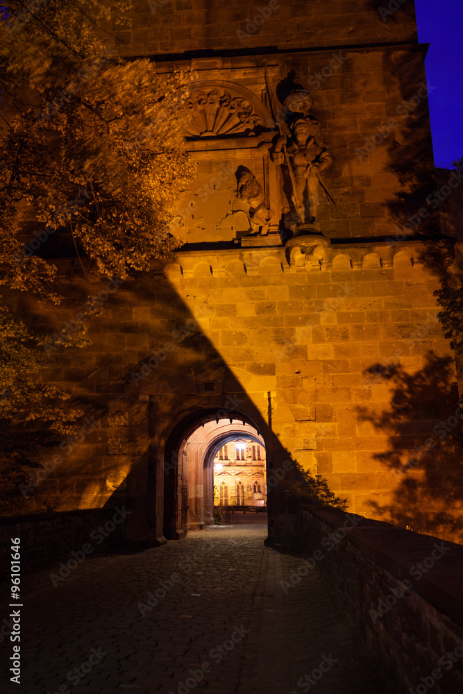 Gates to Schloss Heidelberg with golden lights