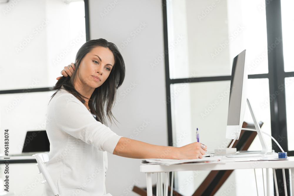 Pretty woman using computer