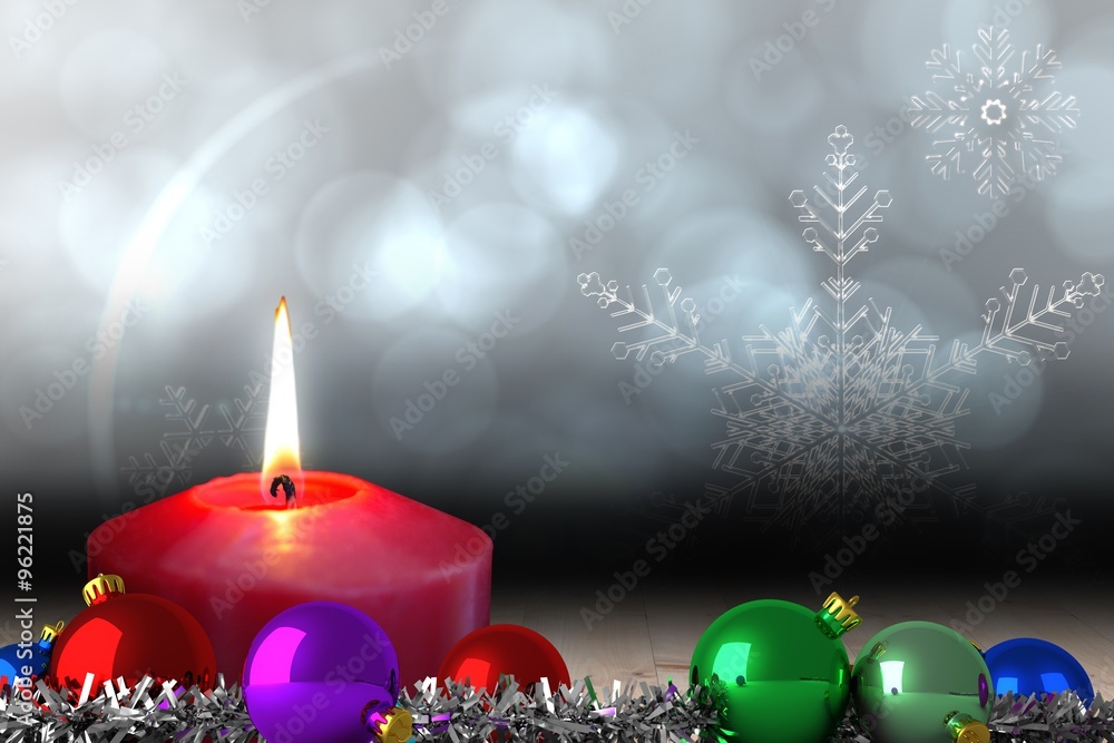 Composite image of christmas baubles and tinsel