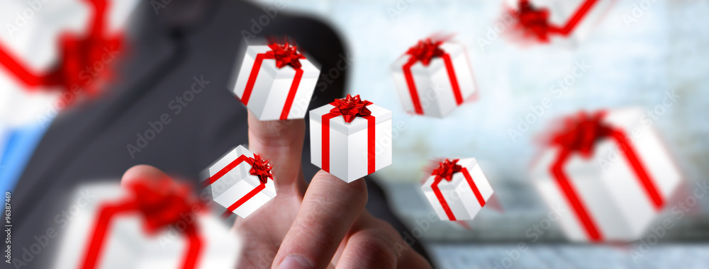 Man celebrating christmas holding gift in his hand