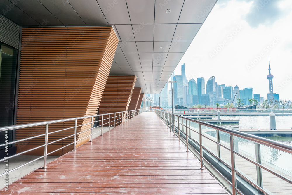 empty wooden road around buildings