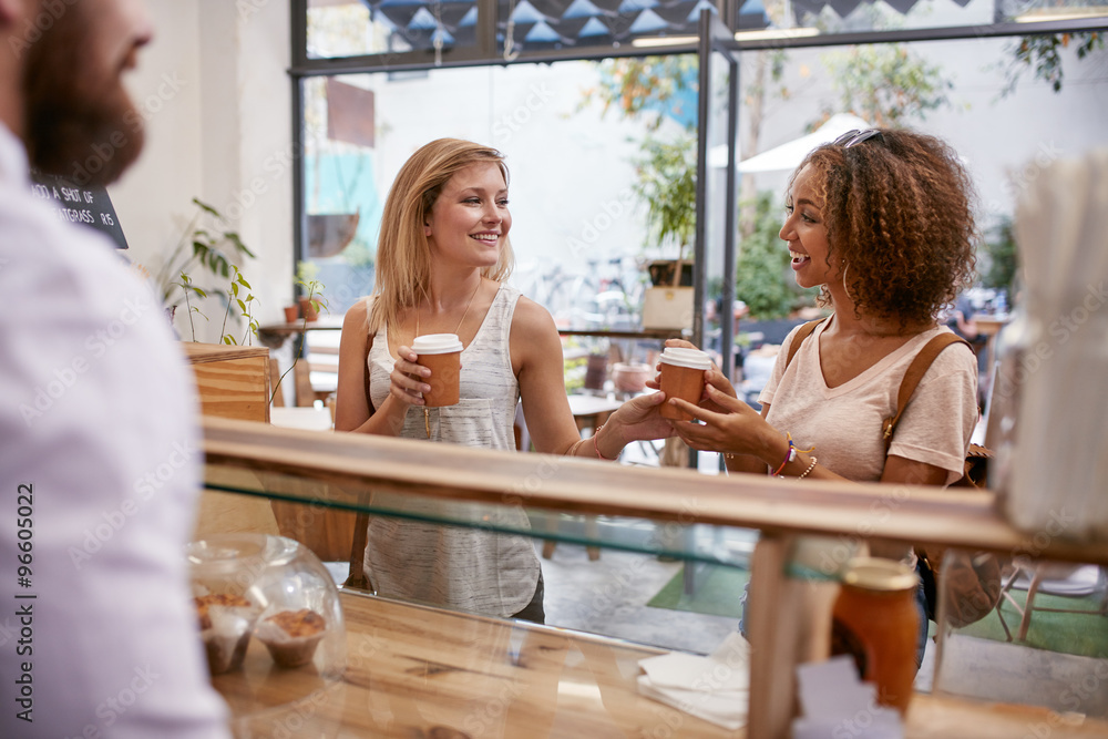 Female friends having coffee