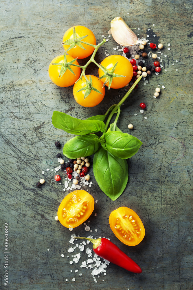 Fresh organic vegetables on rustic background