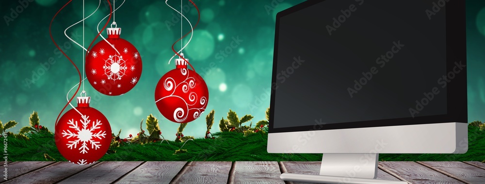 Composite image of digital hanging christmas bauble decoration 