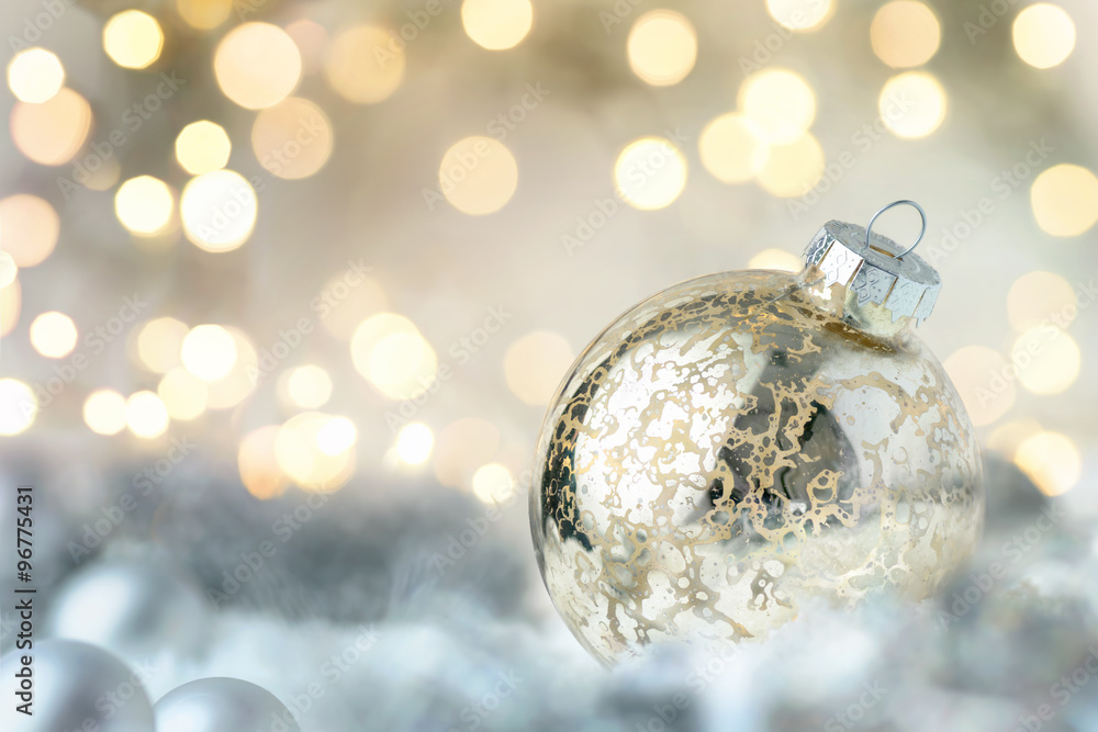 Shiny Christmas bauble and glittering lights