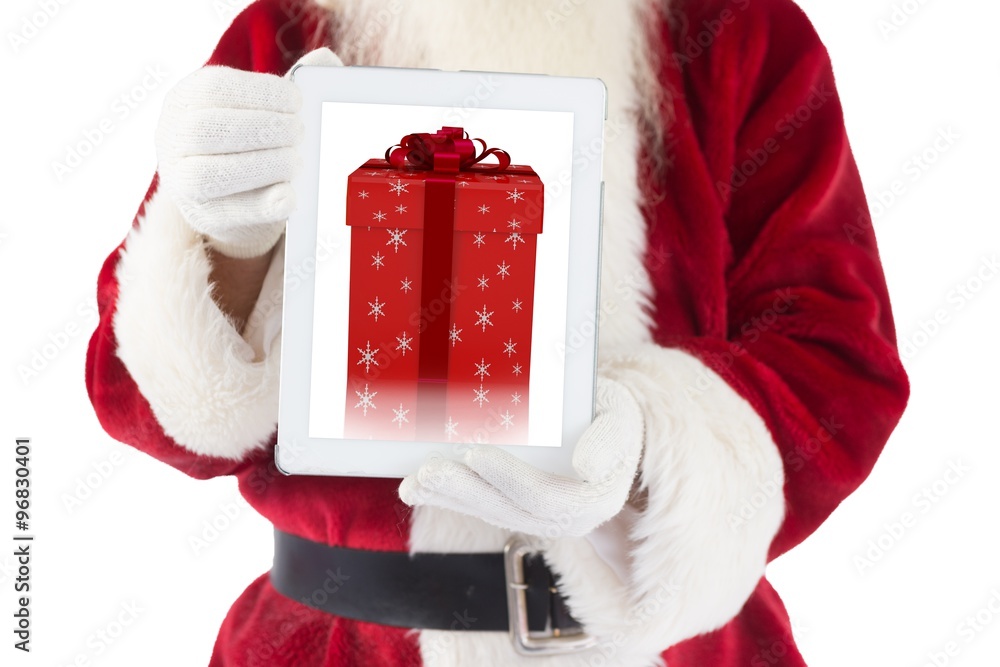 Composite image of santa claus showing tablet pc