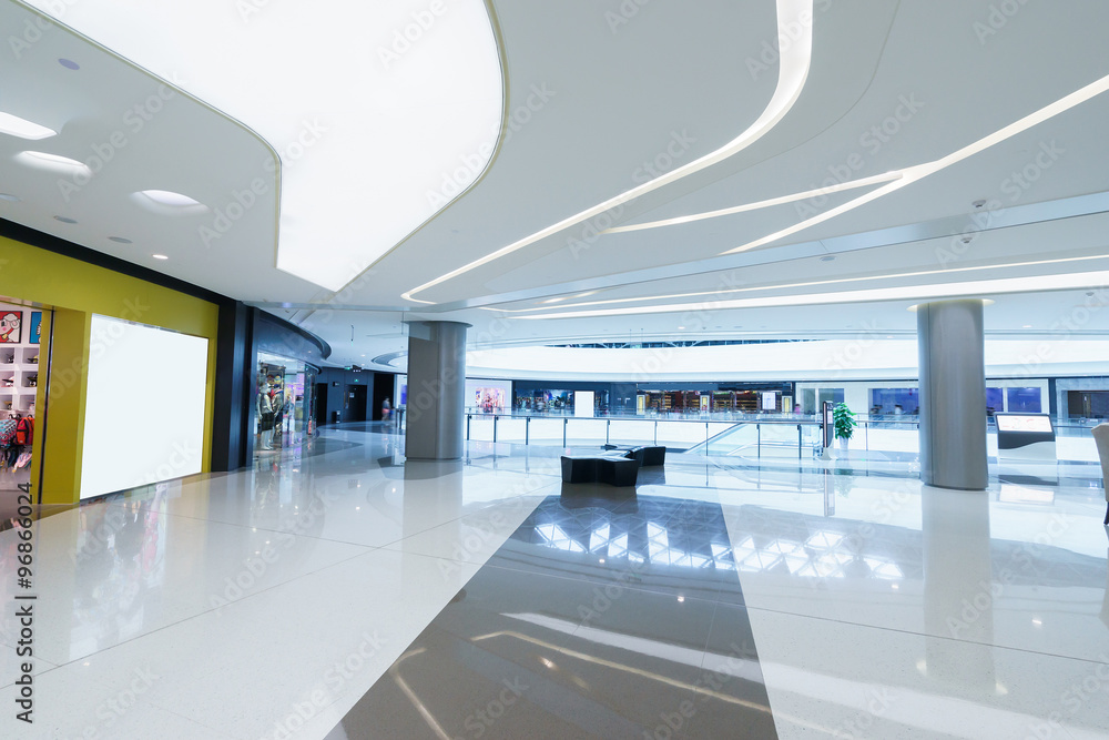 empty hallway with a huge billboard and abstract ceiling in mode