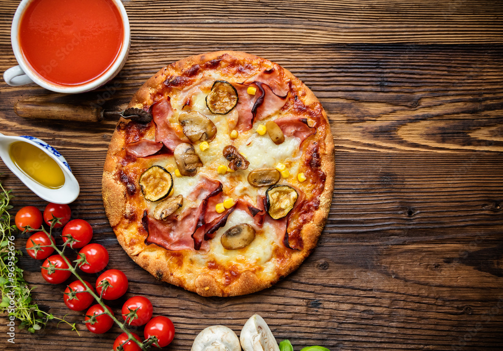 Delicious italian pizza served on wooden table