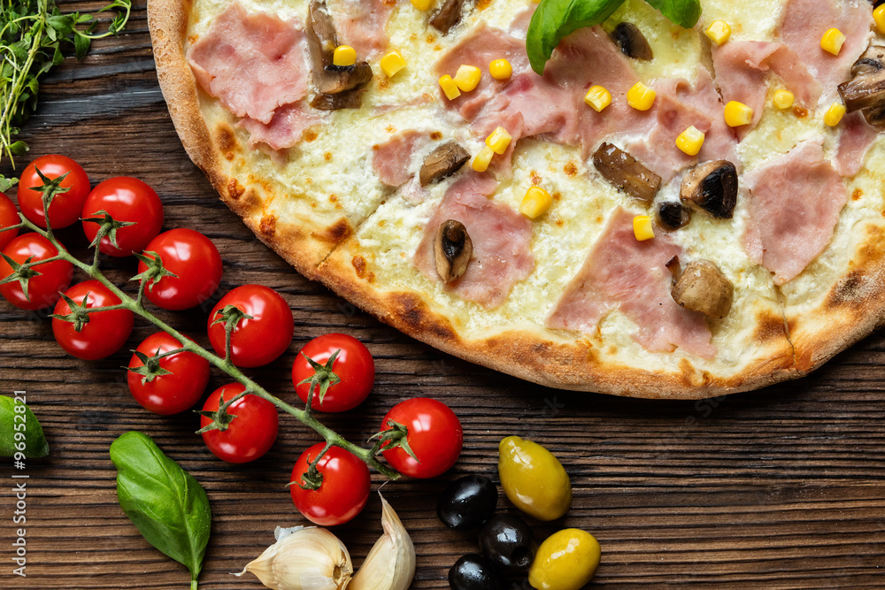 Delicious italian pizza served on wooden table