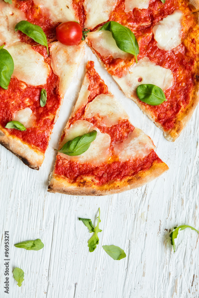 Delicious italian pizza served on wooden table