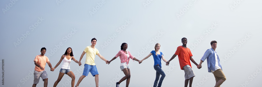 Group Casual People Walking Together Outdoors Concept