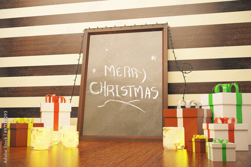 Picture frame with Merry Christmas lettering and gift boxes on w