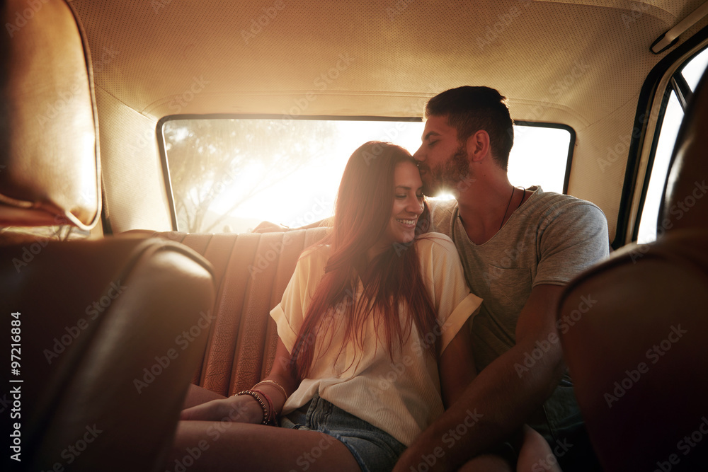 Relaxed young couple on a road trip