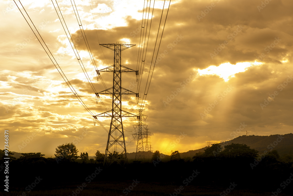 Energy Distribution Network - Electricity Pylons against Orange