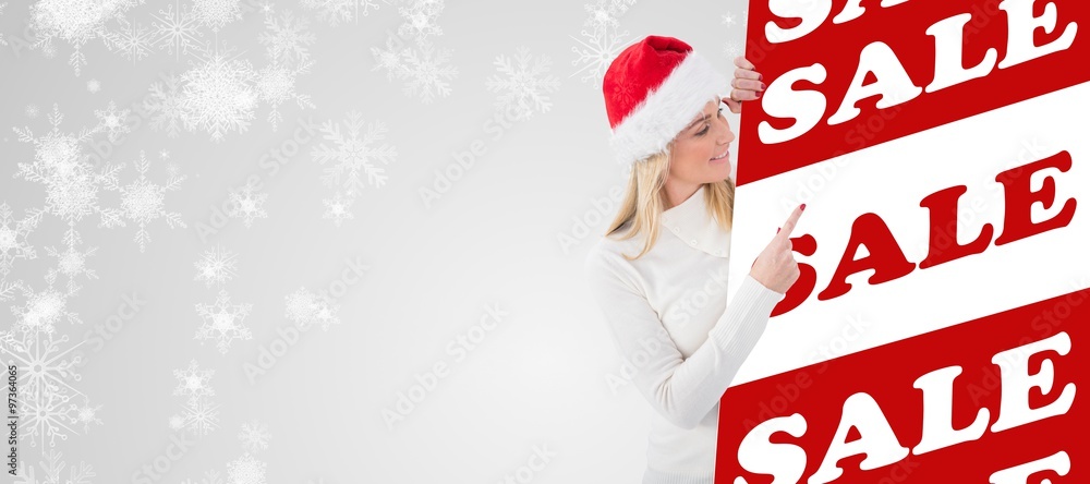 Composite image of festive blonde showing poster