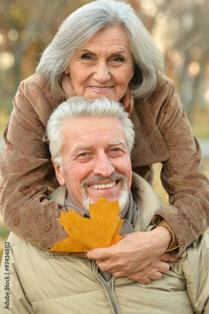 Senior couple in autumn park