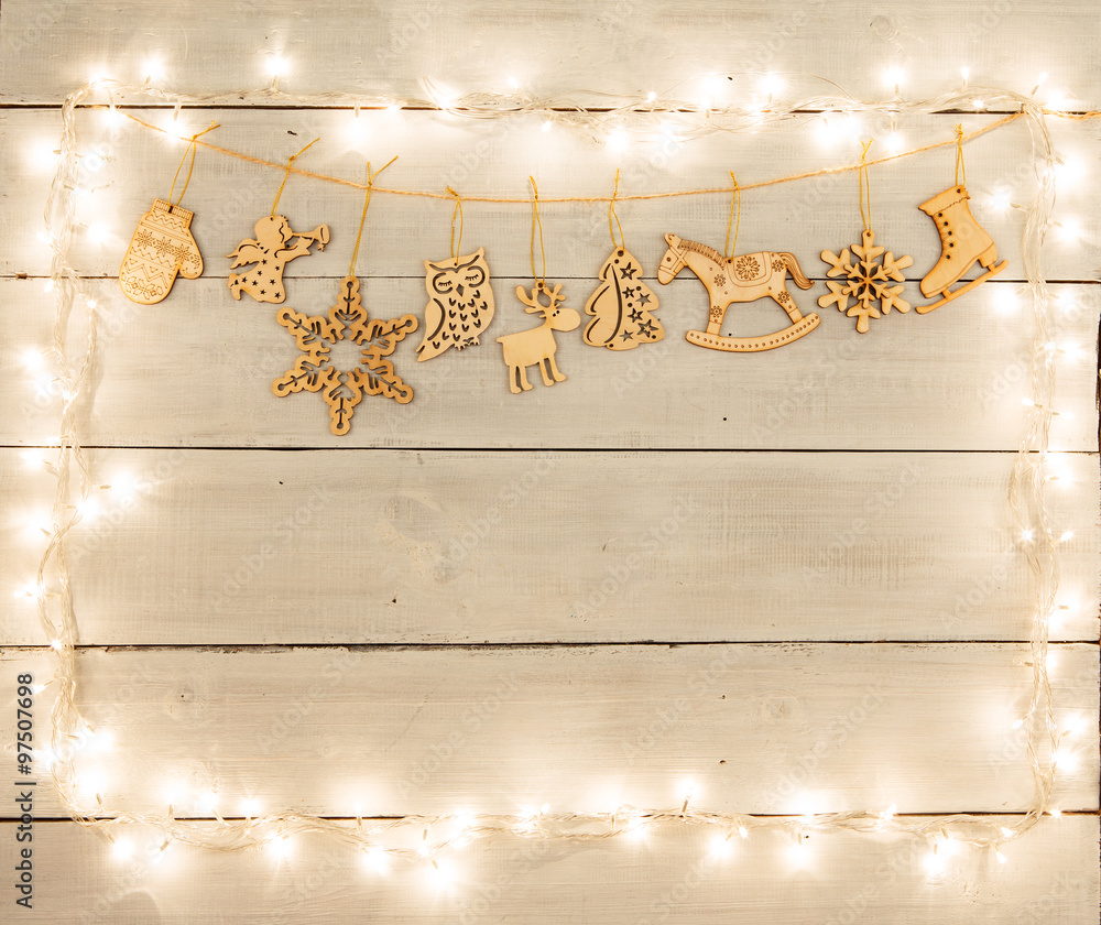 Vintage christmas decoration on wooden table - angel, deer, hous