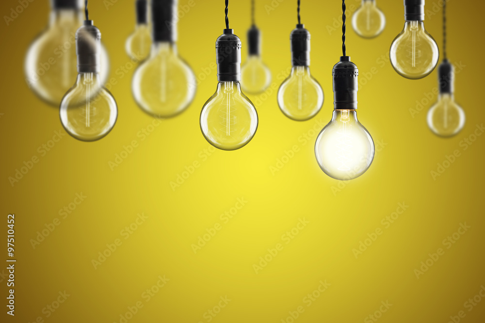 Idea and leadership concept Vintage incandescent Edison bulbs on