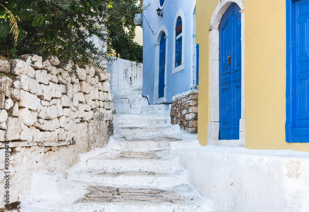 Narrow old colored streets of greek island. Kastelorizo, Greece.