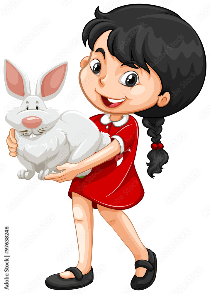 Little girl holding white rabbit