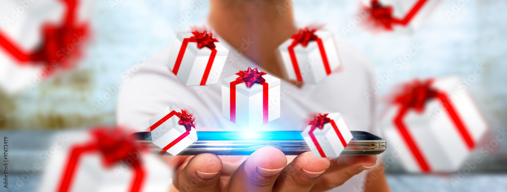 Man celebrating christmas holding gift in his hand