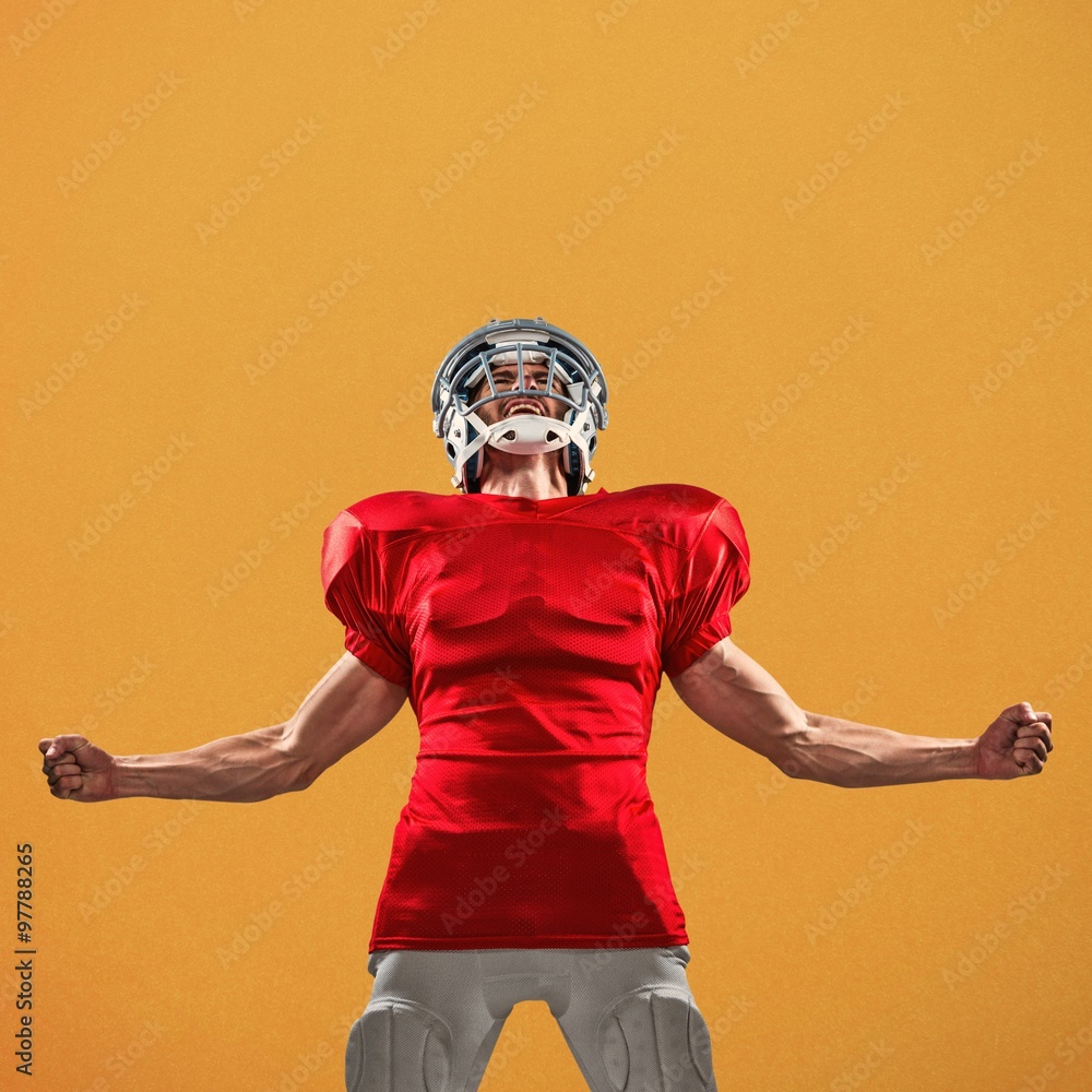 Aggressive american football player in red jersey