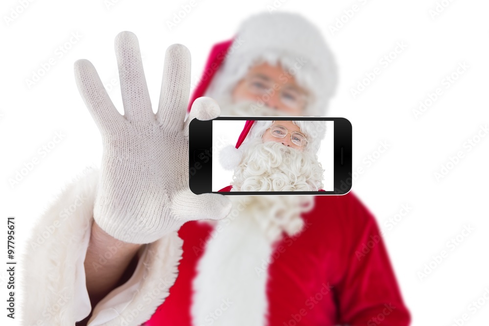 Composite image of hand holding mobile phone