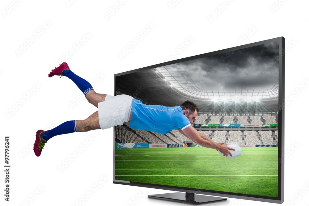 Composite image of rugby player scoring a try