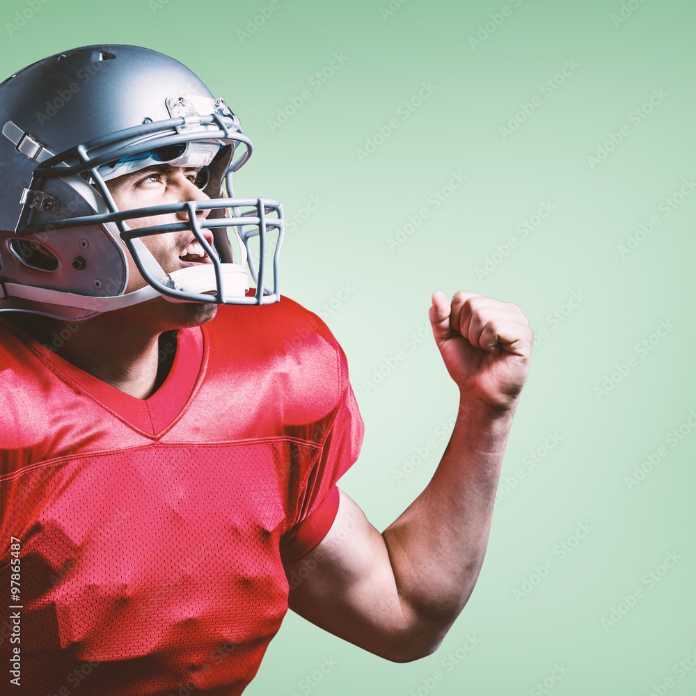 Composite image of american football player cheering