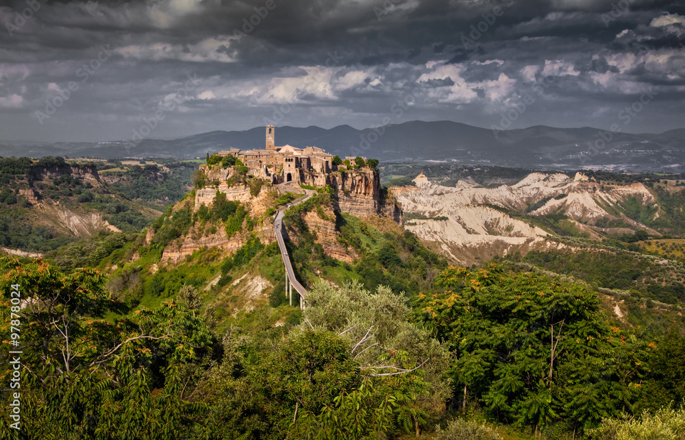 Civita di Bagnoregio with dramatic clouds, Lazio, Italy