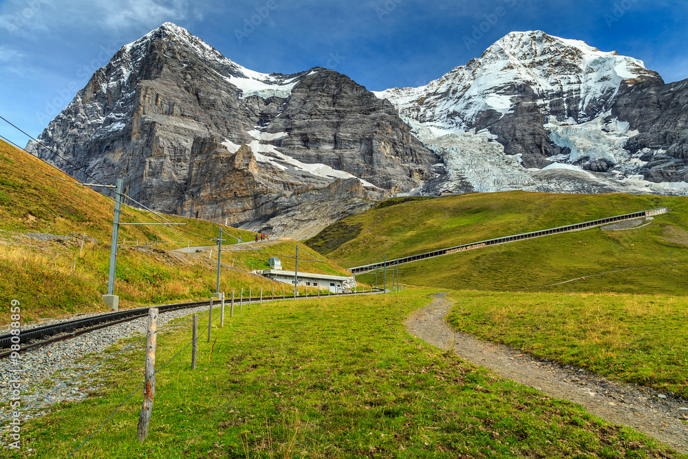 Electric trailway and Eiger North face,Bernese Oberland,Switzerland,Europe