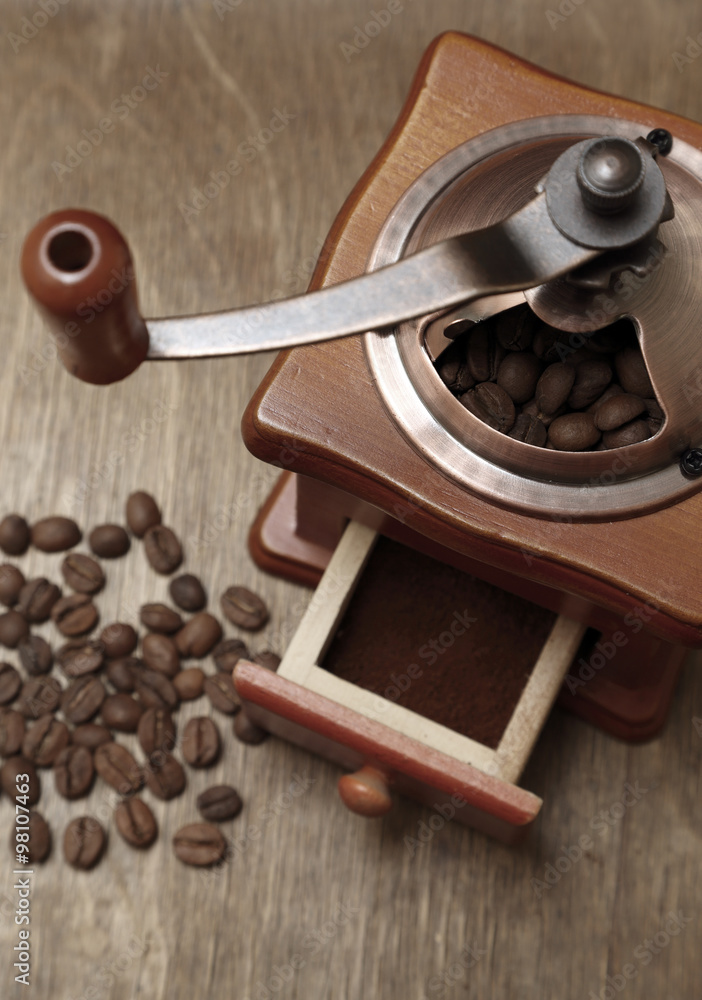 vintage coffee grinder and beans