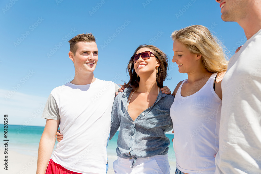 Company of young people on the beach