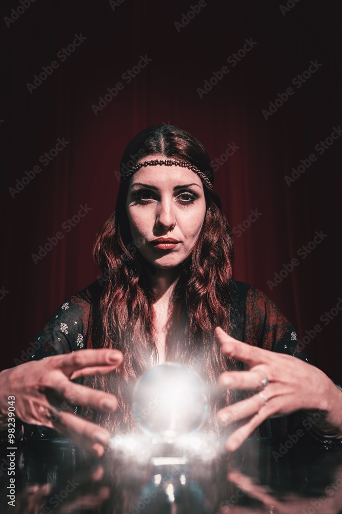 Fortune teller using crystal ball