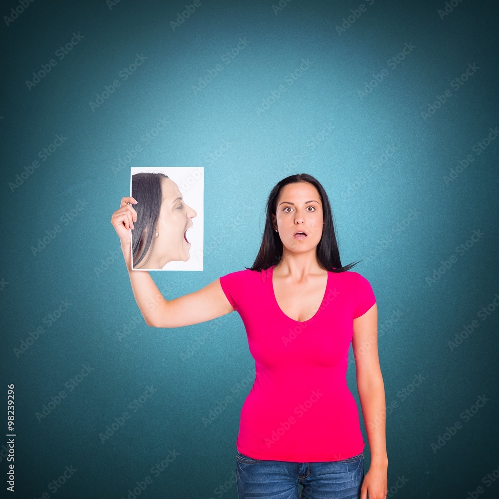 Composite image of woman showing picture of herself