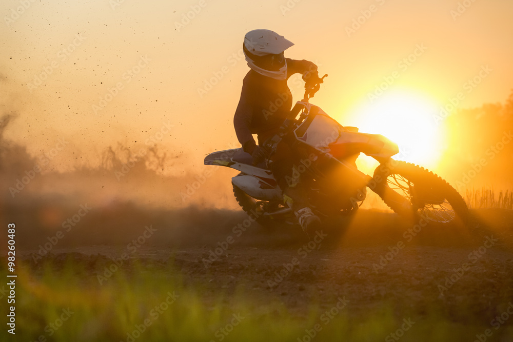 Silhouette motocross speed in track