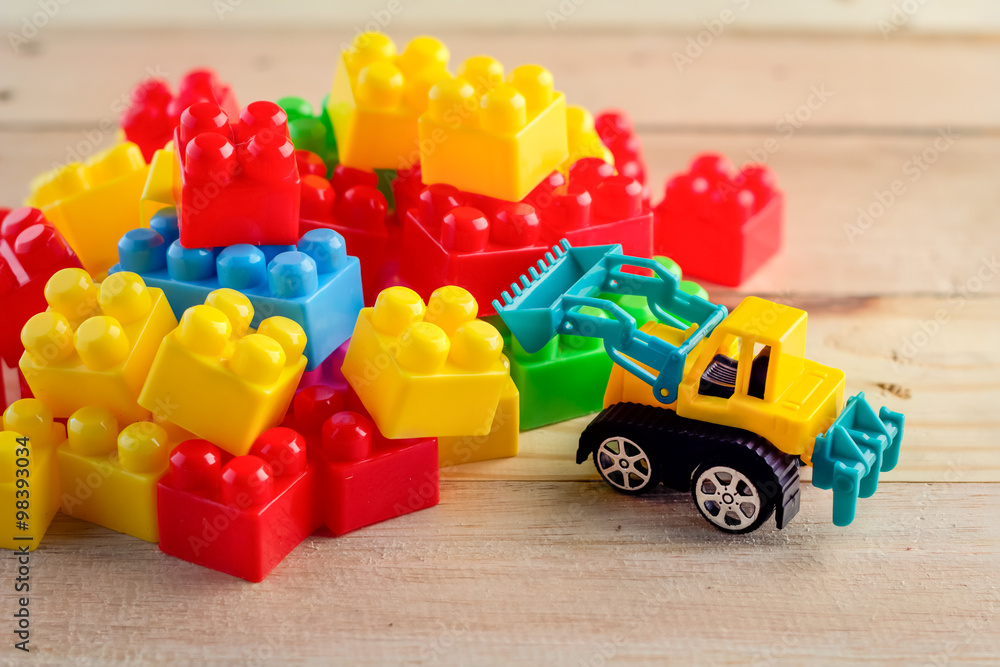 colorful block toy with bulldozer toy