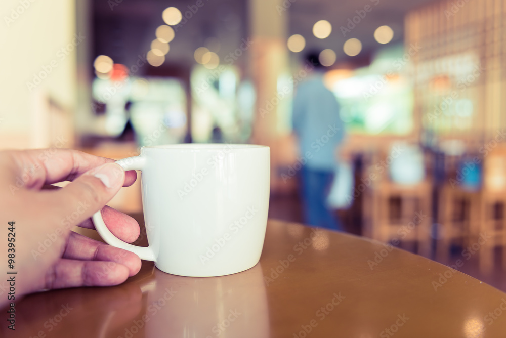 white coffee cup in coffee shop