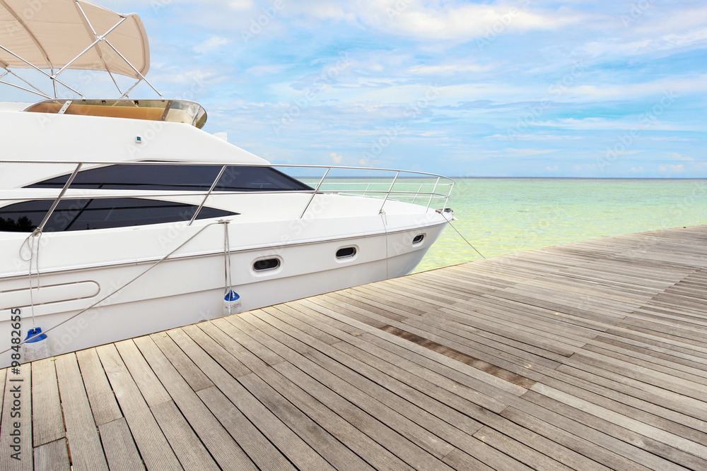 sunlight skyline and yacht along wooden floor