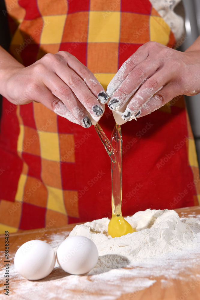 Woman kneading dough