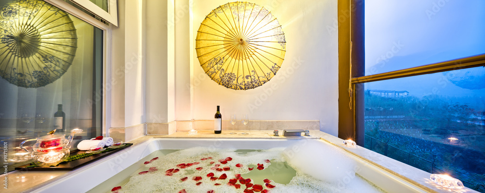 interior of bathroom with bathtub with rose