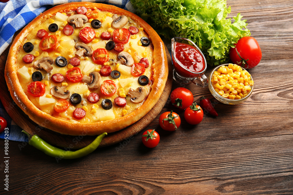 Delicious pizza with vegetables and meat, close-up