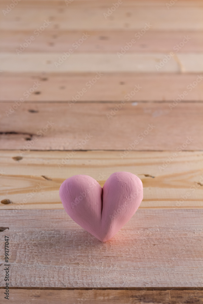 Valentines Day with heart icon on wooden floor