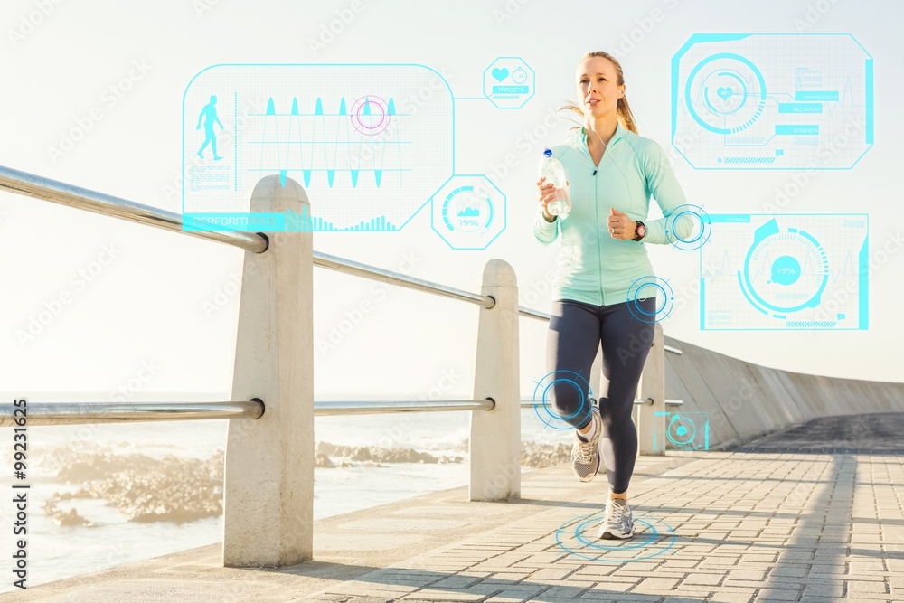 Composite image of focused fit blonde jogging at promenade