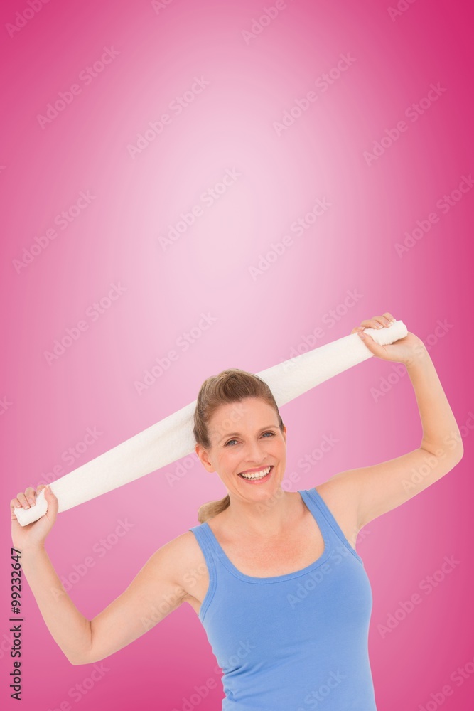 Composite image of fit woman holding white towel